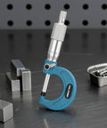 Generic Digital Gauge Precision Caliper Tool Electronic Screen Measurement Device Sturdy Body Construction Knurled Thimble Design Suitable for Workshop Home, Industrial Model 50-75MM on a workbench.