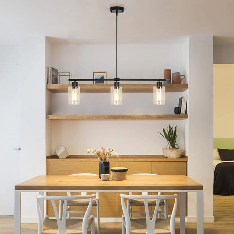 Three Light Black Pendant Lights for Kitchen Island with Glass Shades and Adjustable Rods Hanging Linear Chandelier over table