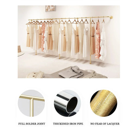 Top Tier Wall Mounted Garment Rack With Built In Shelves And Brushed Gold Finish Straight, displaying dresses and tops.