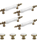 Slick Vintage Style Antique Bronze And White Crackled Ceramic Cabinet Pull And Knob Set Of Eight Pieces, showcasing four handles and four knobs.