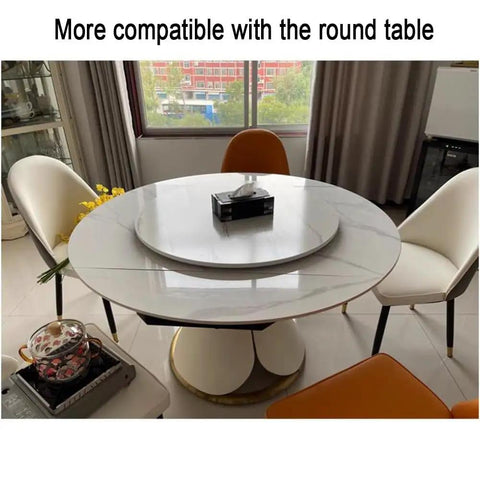Handcrafted Rustic Wooden Lazy Susan Turntable on round dining table with white chairs and centerpiece.