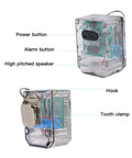 Hella Dependable Firefighter Distress Alarm With Automatic Motion Detection And A Dang Bright Red Led Beacon Signaling A Continuous 100 Decibel Safety Bell for Emergency Rescue Teams and First Responders, clear casing with buttons and hooks visible.