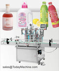 Top Tier Knockout Automatic Liquid Filling Machine with milk syrups and bottle samples, stainless chassis, for easy packaging.