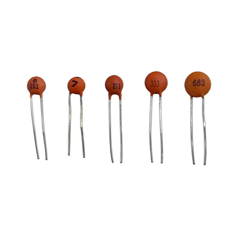 Badass Ceramic Capacitor Assortment Kit Loaded With Forty Two Values Containing 1680 Pieces Spanning 1pF Through 100nF At 50V showing five ceramic capacitors with distinct values.