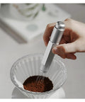 Professional Espresso Coffee Ground Distributor With 16 Stainless Steel Needles Magnetic Telescopic Stirrer leveling coffee grounds.