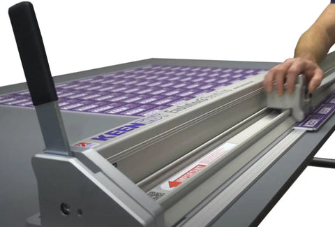 Evolution3 BenchTop Material Cutter Pro Grade 144 Inch Cutting Length With Self Adjusting Track Roller System in use