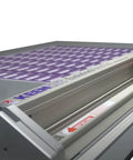 Evolution3 BenchTop Material Cutter With 110 Cm Cutting Length Self Adjusting Track Roller System in use cutting materials.