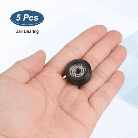 5Pcs Badass Nylon Roller Bearings For Pulley Track Guide 625Z Ball Bearing Kit 5X24X10mm in a hand showing the nylon roller