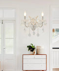 White Crystal Wall Sconce Lighting With Modern K9 Glass Crystal Drops Shade above a white dresser in living room