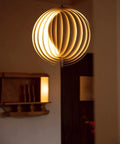 Dope 360 Degree Adjustable Moon Pendant Light With Rotating Sphere Shade For Modern Dining Rooms And Living Spaces Semi Embedded Installation E26 Base White Finish Ideal For Kitchen Islands Bedrooms Hallways Coffee Shops, lit with warm glow in home setting