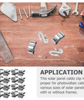 Hella Tough 50 Pack Stainless Steel Solar Cable Clamps For Photovoltaic Wire Management on workbench with tools.
