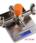 Real Badass Heavy Duty Dual Outlet Air Compressor Manifold NPT Zinc Alloy Splitter Valve on digital scale showing weight.