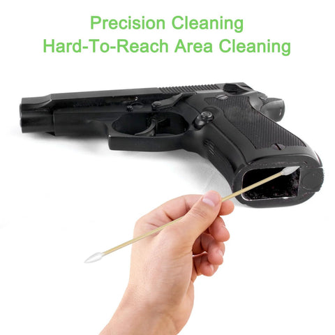 Gun cleaning cotton swabs on bamboo sticks with white cotton tips used to clean a handgun barrel