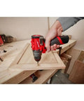 Badass Cordless Compact Drill Driver With Half Inch All Metal Chuck And Mechanical Clutch used on a wooden frame.