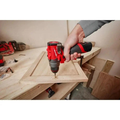 Badass Cordless Compact Drill Driver With Half Inch All Metal Chuck And Mechanical Clutch used on a wooden frame.