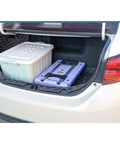 Lightweight Folding Platform Cart With Smooth Rolling Wheels And Slick Collapsible Hand Truck For No Sweat Home Moving Plus Reliable Utility Dolly For Weekend Project Hauling Ready in car trunk with storage container.