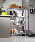 Rock Solid Heavy Duty 4 Tier Steel Wire Storage Rack With Durable Chrome Finish Adjustable Height Shelving Unit For Garage Kitchen Or Office Organization 1000 Lb Capacity in a kitchen with cookware and food containers.