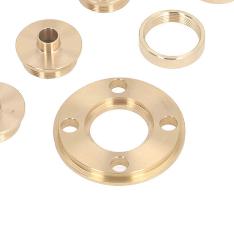 Hella Sturdy Brass Router Template Guide Set With Eleven Precision Bushings Ranging From Ten Mm To Thirty Mm Inner Diameter showing brass bushings.