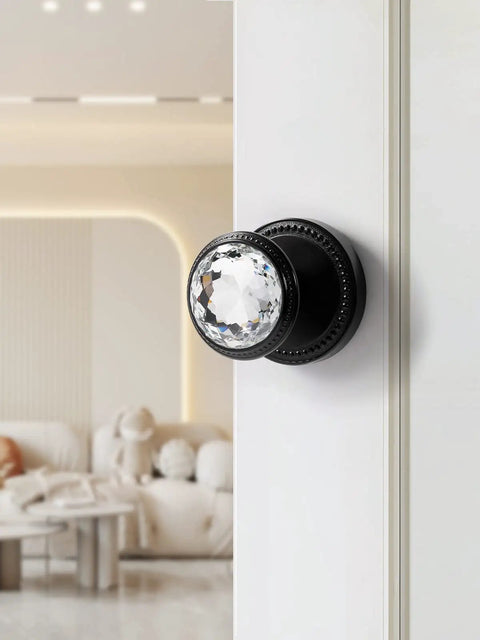 Gold Interior Privacy Glass Door Knob With Lock For Bedroom And Bathroom in polished brass finish, installed on white door.