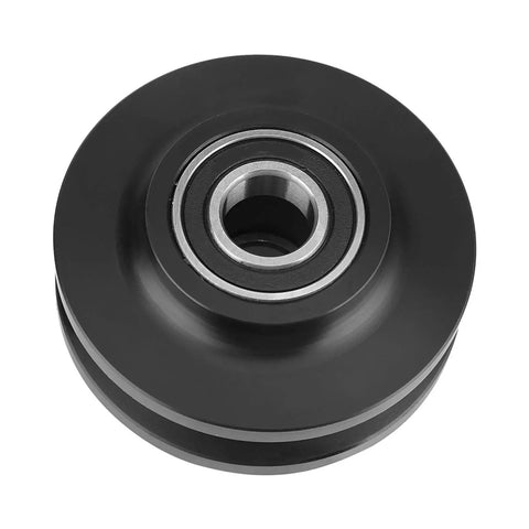 Close-up view of a durable black nylon roller bearing from Top Shelf Two Pack Sliding Barn Door Rollers featuring heavy duty cabinet hardware.