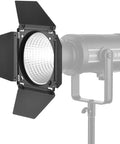 Heavy Hitter Seven Inch Barn Door Lighting Kit With Adjustable Honeycomb Grid And Four Pumped Up Color Gel Filters For Dialing In Crisp Beams On Standard Studio Flash Heads mounted on a Godox SL150.