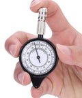 Trail Tested Map Measuring Wheel Odometer For Camping Hiking And Backcountry Adventures Built Like A Tank and Smooth Rolling Action Super Lightweight Pocket Gear making Navigation Dead Simple shown in a hand.