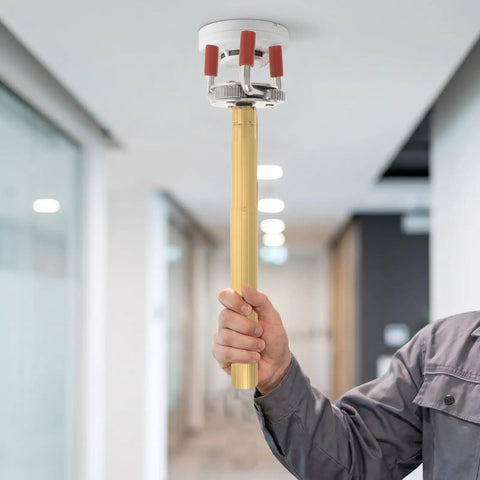 Heavy Duty Aluminum Smoke Sensor Removal Tool Ladder Free Ceiling Install Kit used for detector swaps in a modern hallway.