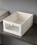 Straight Up Durable Cotton Linen Foldable Closet Organizer Bins Set Of Three With Tough Handles And Clear Window Collapsible Fabric Storage Cube on shelf.