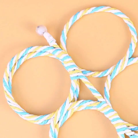 Close-up of colorful paper rattan rings for Paper Rattan Scarf Hanger With 12 Foldable Rings For Wardrobe And Closet Organization Keep Your Fits Tight With This Dope Hijab Holder And Tie Rack Zero Clutter Vibes Guaranteed.