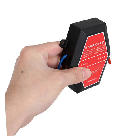 Hella Compact Self Activating Automotive Fire Extinguisher Straight Up Rapid Flame Suppressant Aerosol Emergency Kit, handheld view.