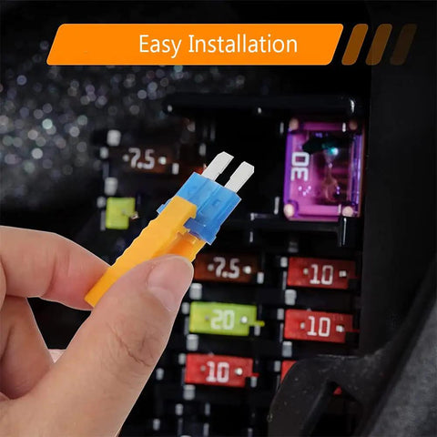 Hand holding fuse puller tool for easy installation of Premium Heavy Duty Universal Auto Blade Fuses Assortment Kit.