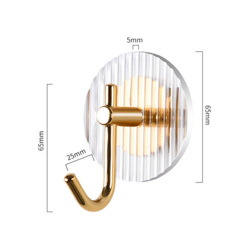 Kick Clutter To The Curb With This Slick Space Saving Wall Hook designed for entryway, made of striped acrylic and gold metal.