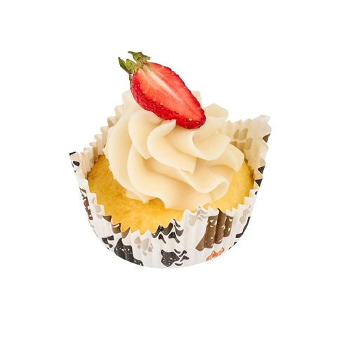 Cupcake in Greaseproof Cupcake Liners 4000 Pack, 4 Oz Disposable Muffin Cups for oven or freezer, topped with cream and strawberry slice.