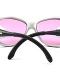 Rock Solid 808nm Infrared Laser Safety Glasses With Tough As Nails Protective Eyewear For Diode Lasers, pink-tinted lenses and black rubber arms.