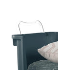 Slick And Hella Spacious Open Front Stackable Storage Basket With Fold Over Handles Galactic Teal Plastic Organizer Bin side view with cushions inside.