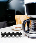 Spiral Shaft Replacement Kit For Chocolate Fountain 4pcs Feed Rods For Home And Small Business Fondue Machines, Precision Engineered For Smooth Chocolate Flow, Ideal For Parties And Romantic Ambiance. black spiral shaft next to glass coffee maker