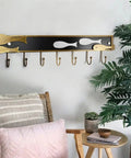 Creative Goldfish Wall Mount Coat Hook Built Tough Durable Metal Entryway Organizer hanging on wall with 7 hooks and goldfish design.