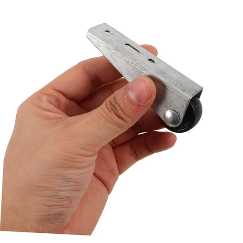 Heavy Duty Five Pack Sliding Door Bottom Guide Rollers With Slick Black Nylon Wheels And Rock Solid Steel Build For A Buttery Smooth Glide Across Universal Tracks With Easy Peasy Installation in hand