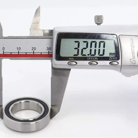 Built Tough Top Tier 440C Stainless Steel Deep Groove Ball Bearings S6804-2RS 20X32X7MM ABEC-3 showing 32mm measurement with caliper.