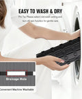 Rock Solid Non Slip Shower Mat With Mega Tight Suction Cups and Rapid Drain Holes being washed in a machine, showcasing easy cleaning.