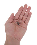 Hand holding a few 800Pcs M2 Self-Tapping Screws Assortment Kit Round Head Carbon Steel Wood And Metal Heavy-Duty Fasteners