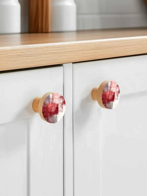 Two Piece Set Top Shelf Solid Beech Wood Round Cabinet Knobs Showcasing Dope Abstract Red And Fresh Sage Green Graffiti Art on kitchen drawer.