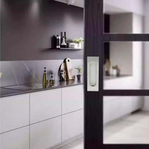 4 Pack 4.72 Inch Recessed Pocket Door Handles Brushed Nickel Stainless Steel Flush Pulls installed on a sliding barn door in modern kitchen