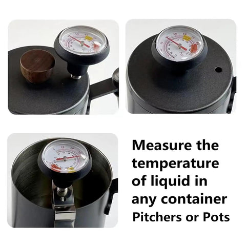 Close-up of a thermometer atop a black container and inserted into a stainless steel pitcher for measuring liquid temperature.