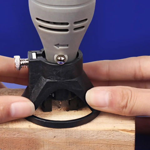 Upgrade Your Workflow With This 2 Pc Mini Electric Grinding Positioner And Locator Set Made From Durable Black Plastic For Precision Drilling, Milling, And Polishing Tasks That Keep Tools Steady, showing a mini grinding positioner clamping a rotary tool on wood.