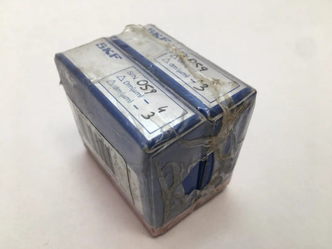Razor Sharp Precision Angular Contact Ball Bearing Pair With 20 mm Bore And 42 mm Outer Diameter in damaged packaging.