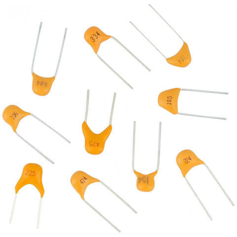 Close-up of multilayer monolithic capacitors in yellow with numbers, part of 500 Piece Ceramic Capacitor Assortment Kit With 10 Values 0.1 uF To 10 uF Multilayer Monolithic Parts Great For Electronics Repair And Hobbies Cool 50 Volt Max Rating Plus Minus 10 Percent Tolerance This Pro Grade Stash Is A Must Have For Tech Pros Who.