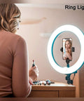 Woman using a ring light with a phone tripod mount with wireless remote and adjustable clamp, 360 degree rotating holder.
