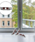 Stainless Steel Sliding Window Roller Double Wheel Heavy Duty Track Replacement 4 Pack shown in window with a cup.