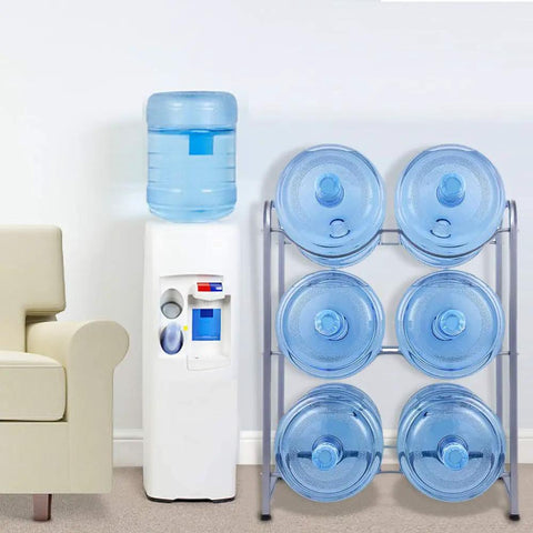 Heavy Duty 3 Tier Water Jug Rack For 5 Gallon Jugs next to water cooler in home office.